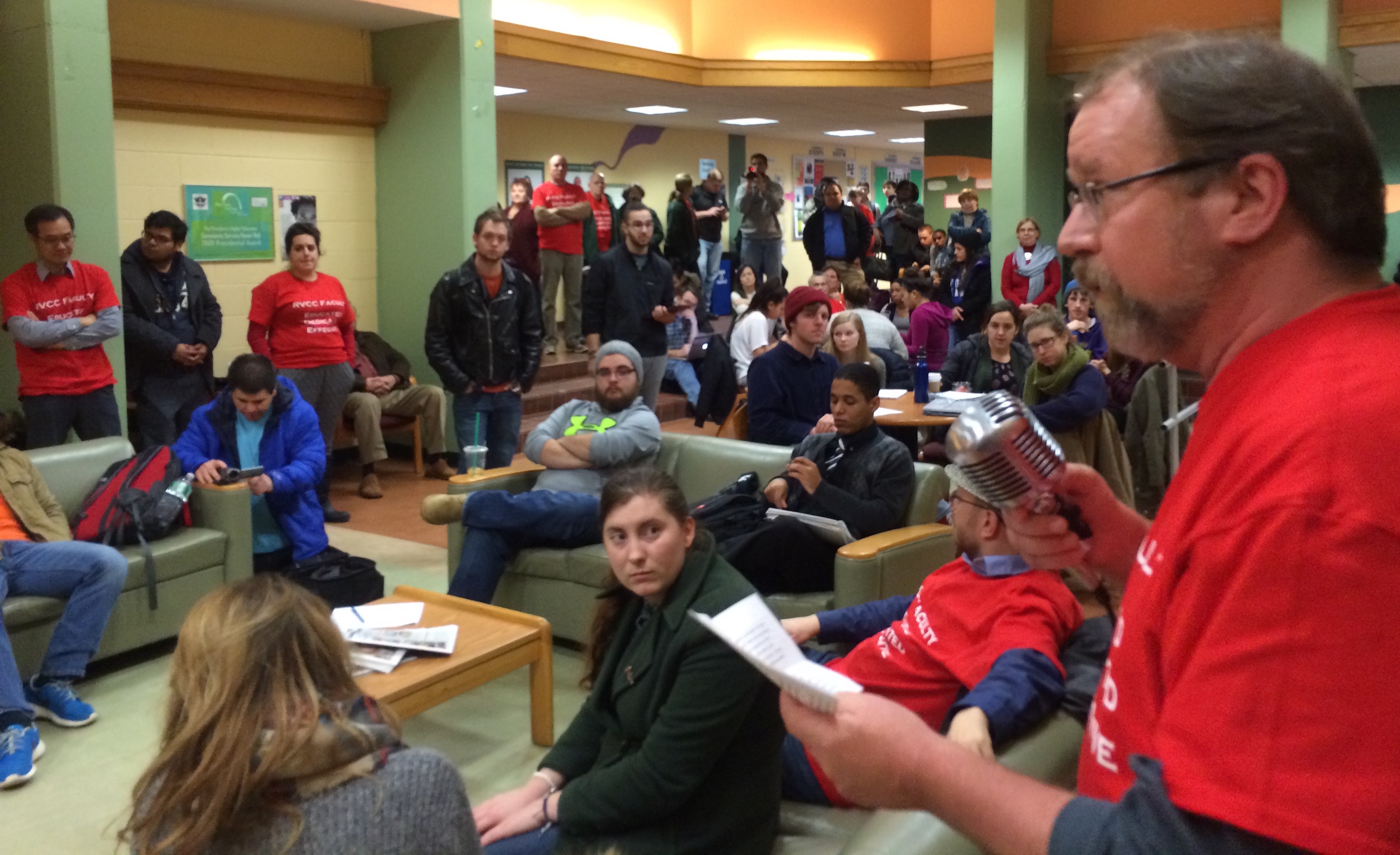 Faculty member Bick Treut speaks to a campus contract rally Feb. 9, 2016
