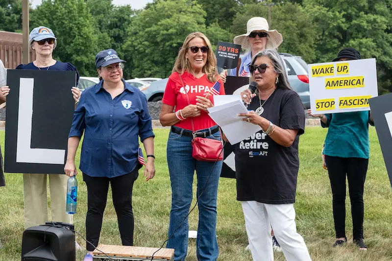 Protect Our Checks rally_Evelyn speaks copy_for newsletter